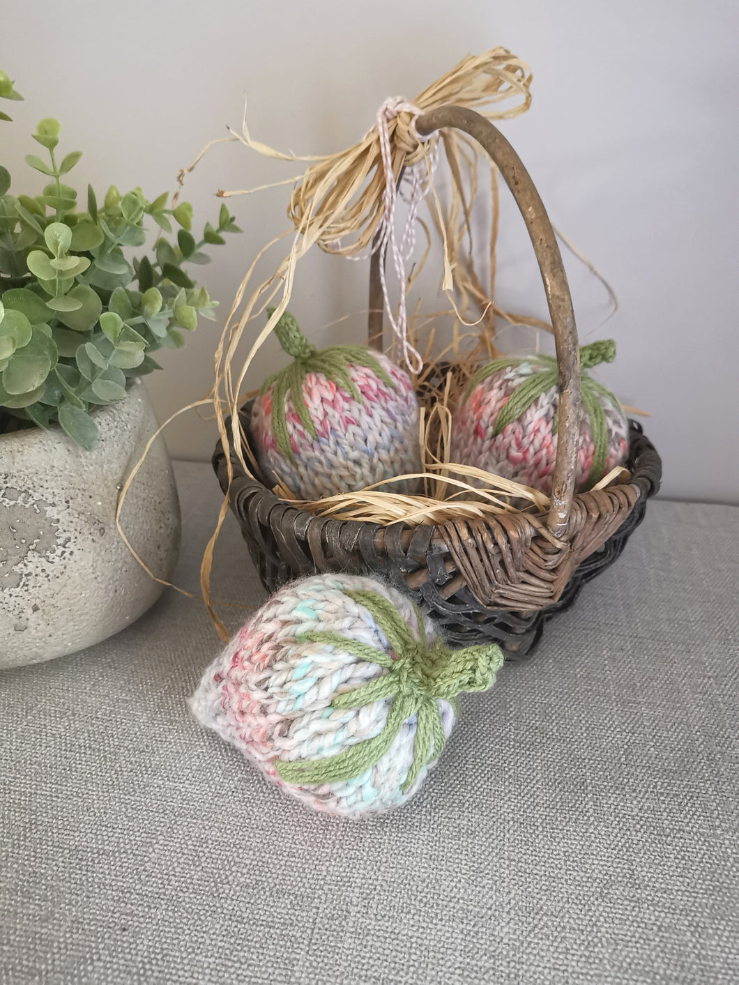 Basket of knitted strawberries